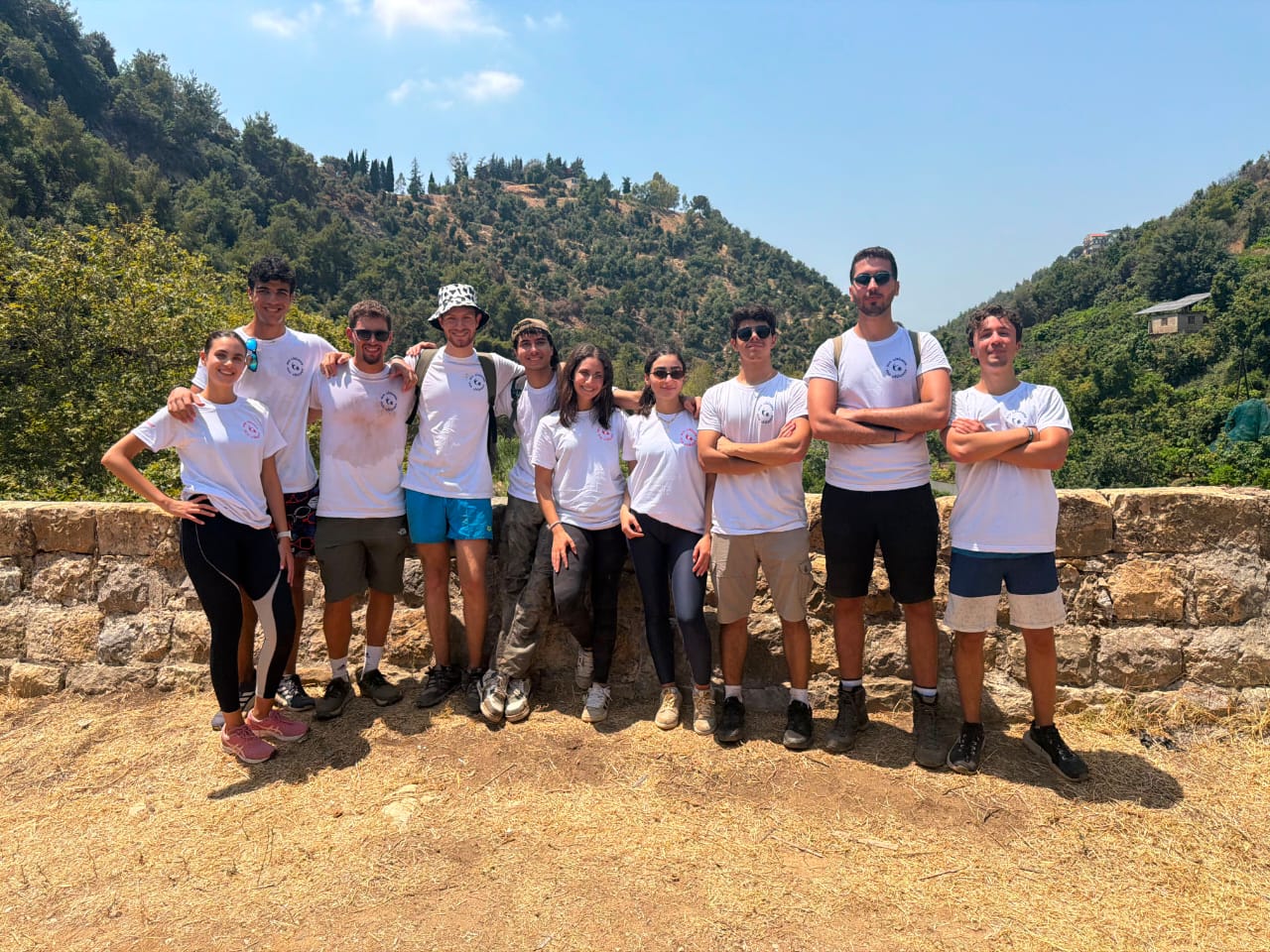 EcoCitizens volunteers posing together in the hills during the Hammana eco-hike
